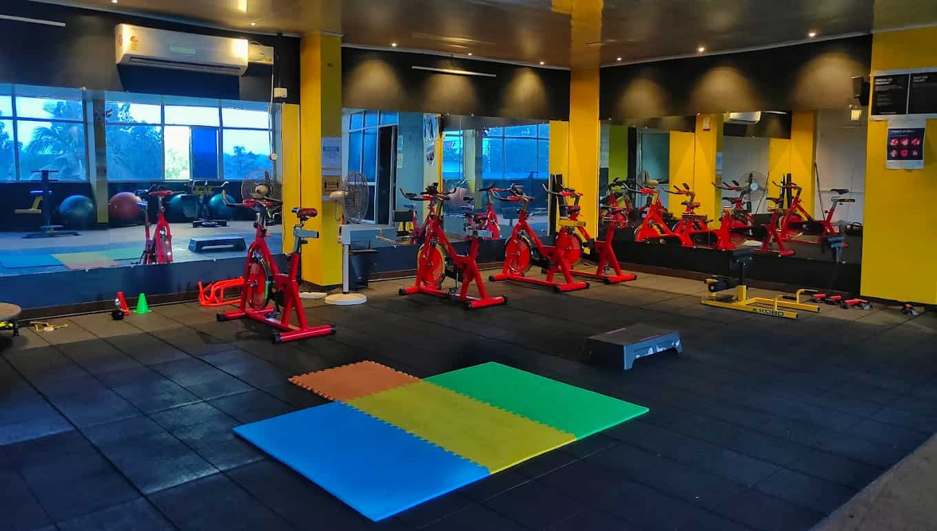 Spacious weight training area with various machines